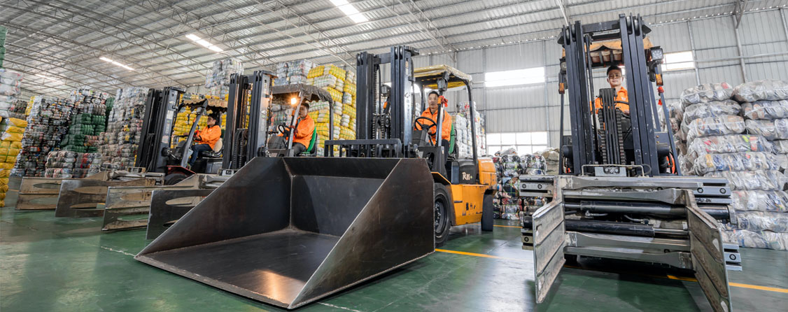 forklift to move large, compressed bales.