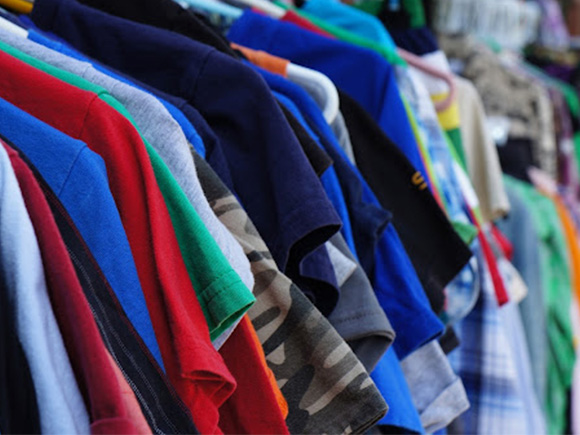 Colorful array of second hand shirts