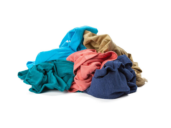 Stack of clothes on white background