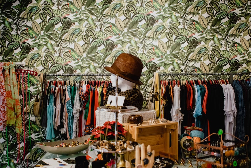 Colorful display of used clothes for sale
