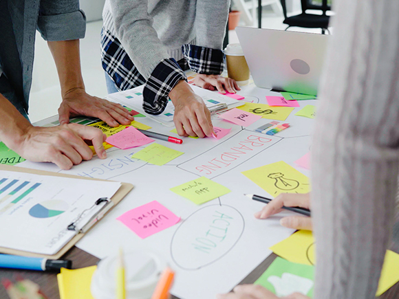 Group discussing ideas in the office