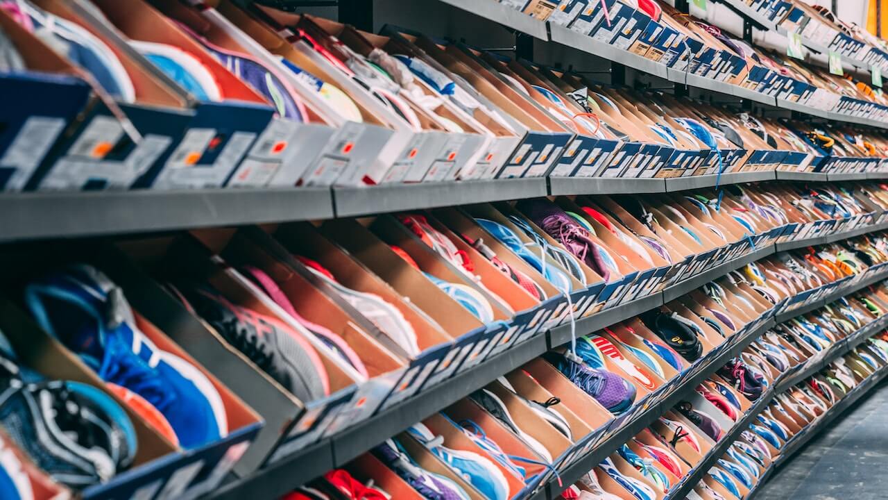 Racks of shoes in a store