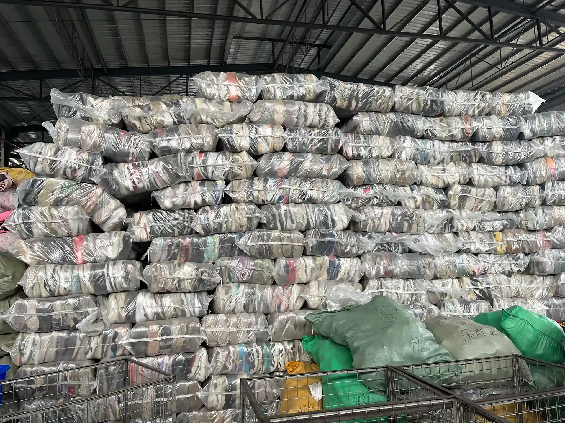 Shoe bales stored in a warehouse for packing review